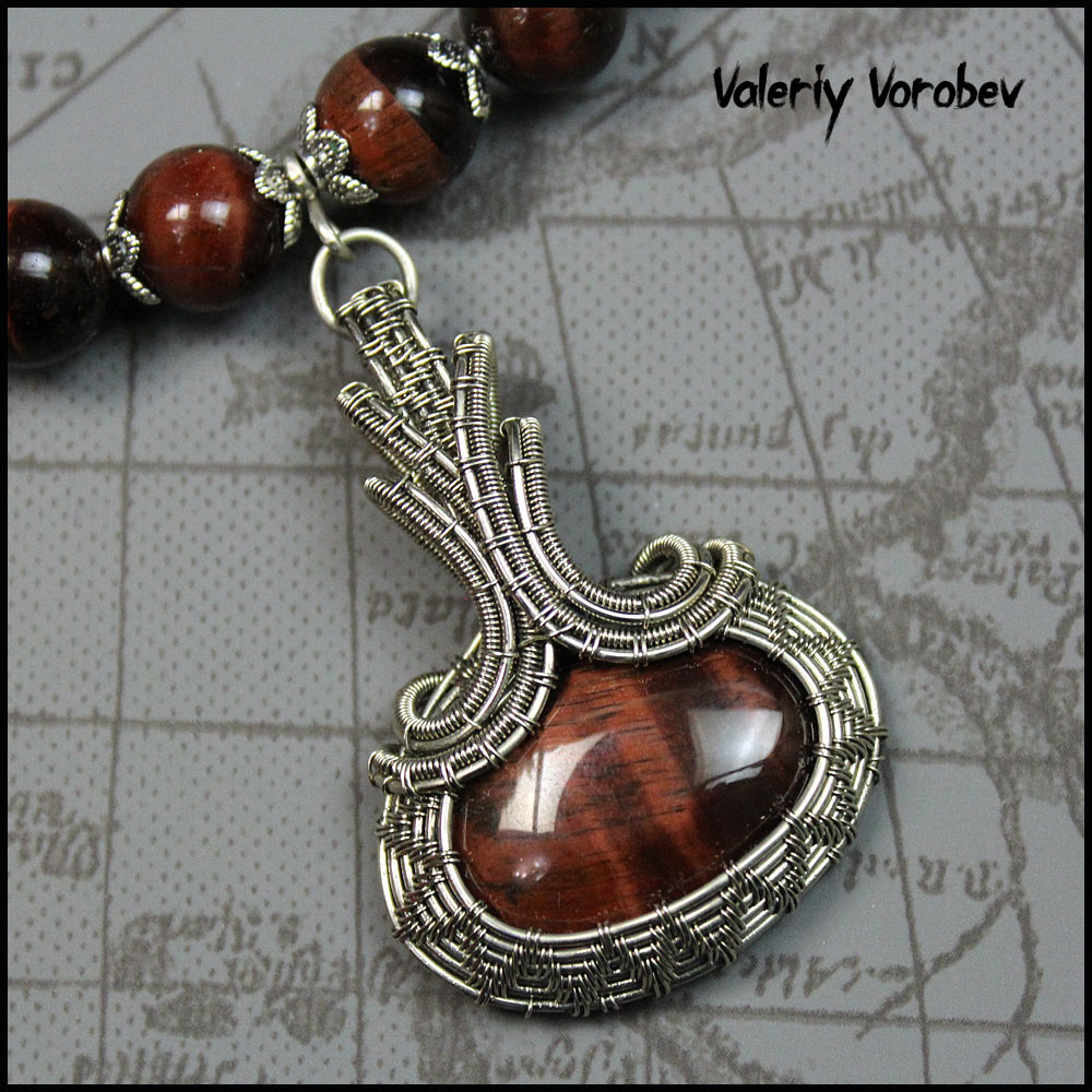 Кулон из нейзильбера и камня Бычий глаз ручной работы